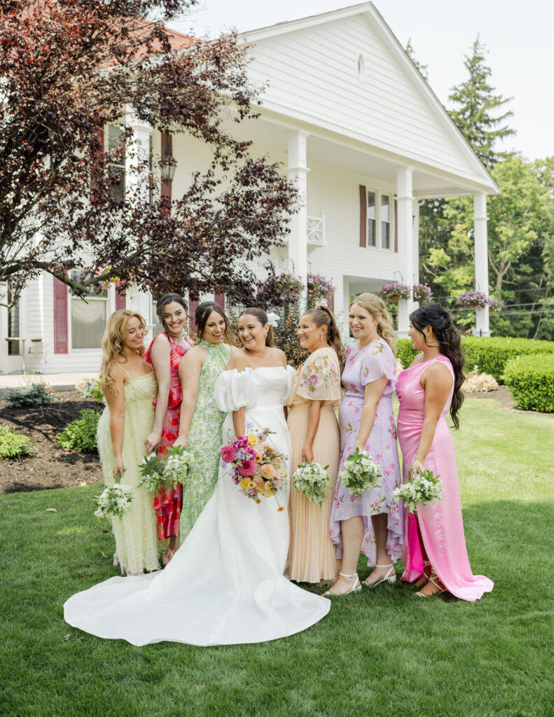 mismatched bridesmaids dresses at avanti mansion in buffalo new york