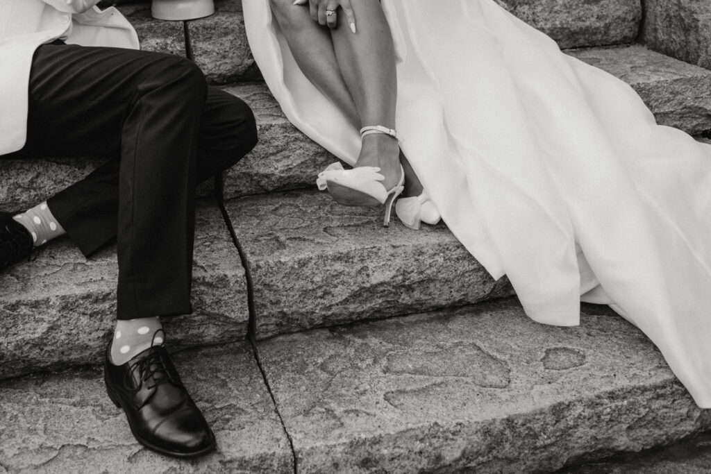 black and white detail photo during private moment with bride and groom