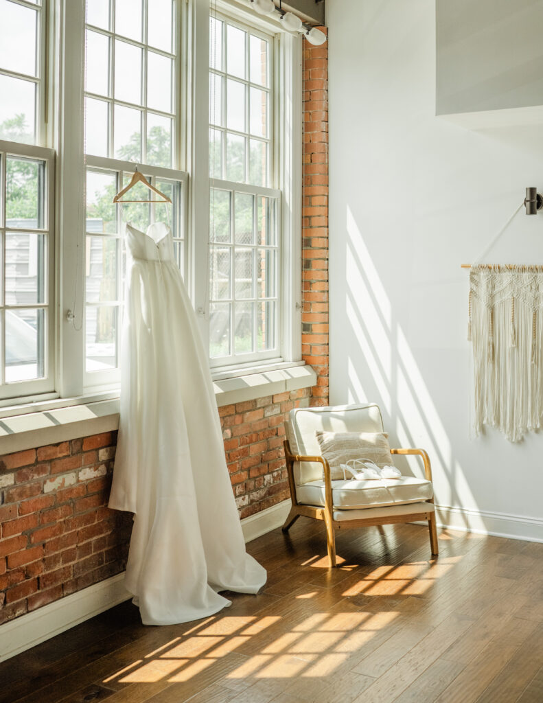 dress hanging up in the window at PIC buffalo