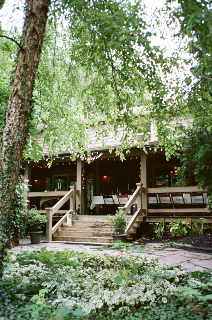 A wedding photo captured on 35mm film featuring the wedding reception area at the grooms house