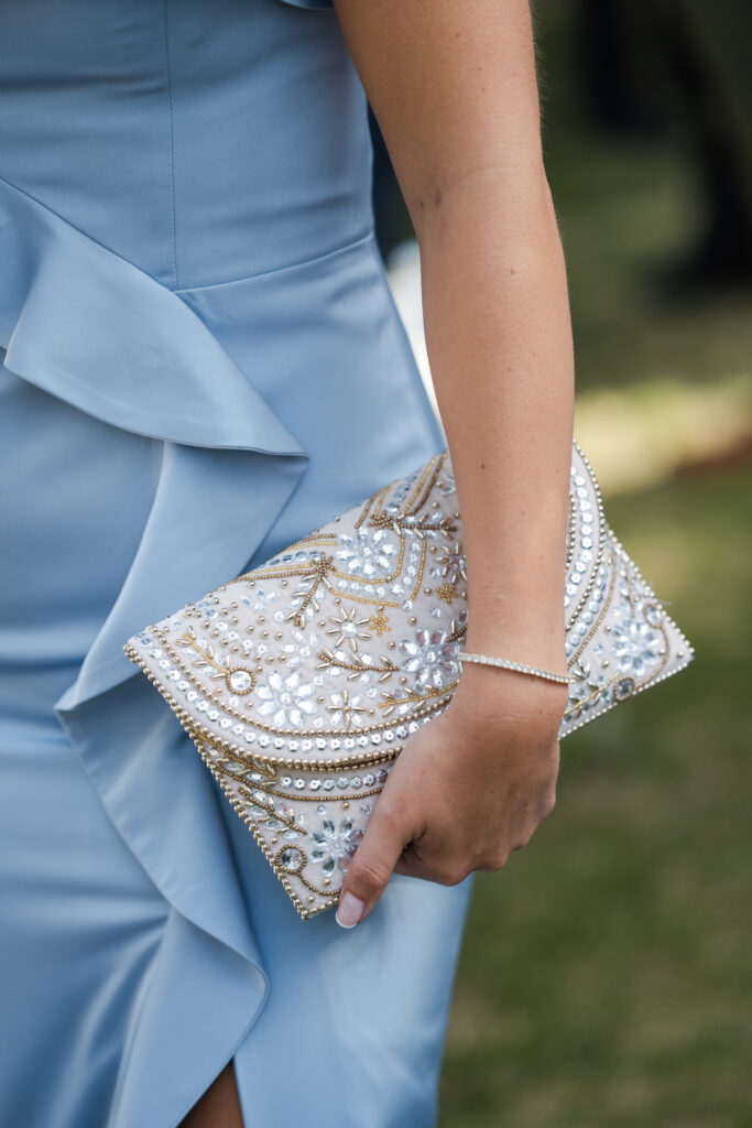 Blue bridesmaid dresses and garden-inspired florals by Tarry Grove at Knox Farm wedding.