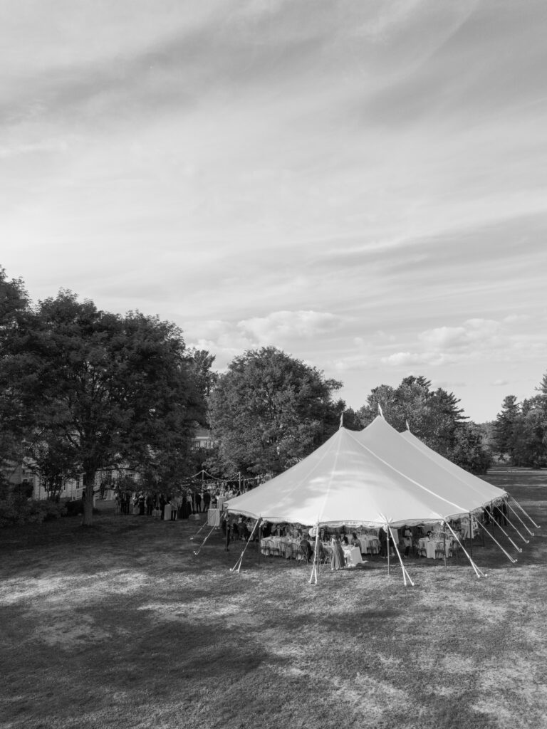 Elegant sailcloth tent reception setup for summer wedding at The Mansion at Knox Farm.