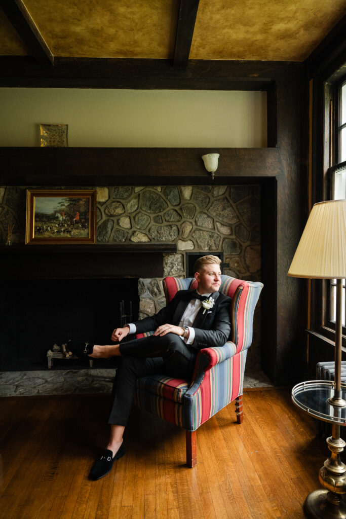 Groom in his Bureau Made tux before ceremony at The Mansion at Knox Farm.