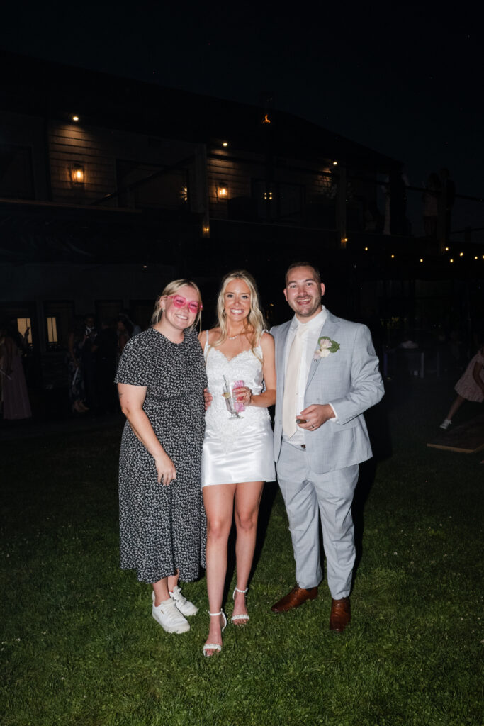 brittany ford photography with a wedding couple during their reception