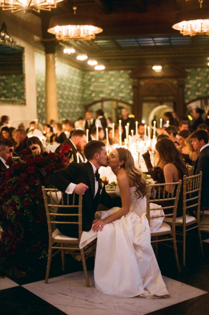film wedding photography of bride and groom during reception