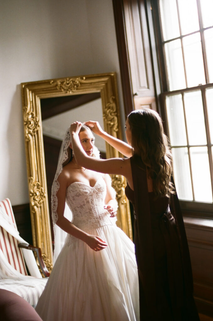 35mm wedding photography bride getting ready candid moment