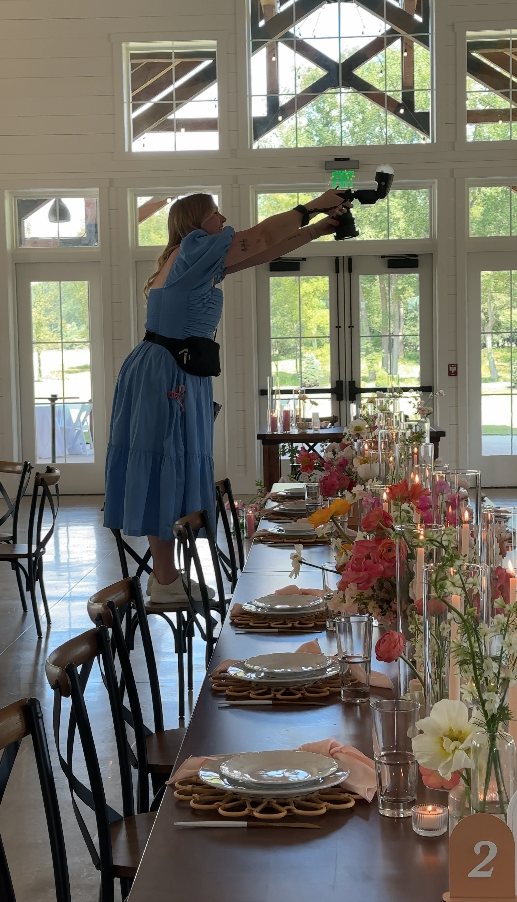 wedding photographer taking detail photos of reception tables at the annex in chaffee new york
