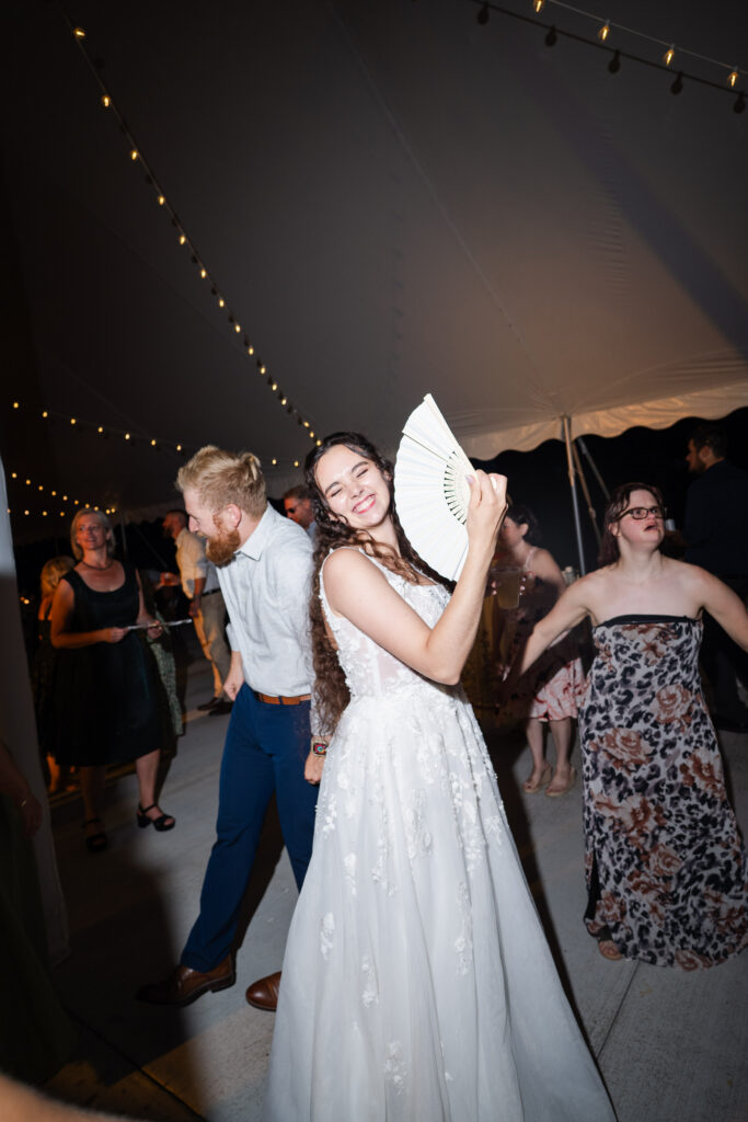 Candid dance floor moments captured at Hillcrest Estate wedding